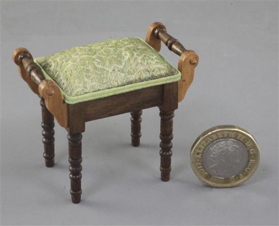Denis Hillman. A Victorian style miniature piano stool, width 2in.